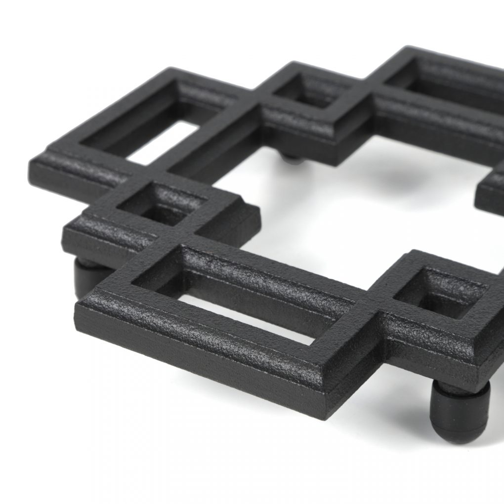 Hand sand-cast iron trivets